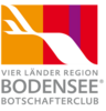 Lake Constance Four-Country Region Ambassadors’ Club Ltd. Logo featuring a stylized white swallow bird over colorful vertical stripes, representing the "Vier Länder Region Bodensee Botschafterclub," a cross-border Lake Constance ambassador club.